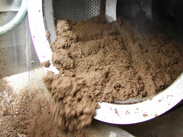 View inside a ThickTech Rotary Drum Thickener in use while thicken solids 
